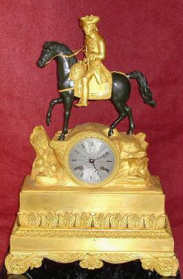 C.1840, French, ormolu and Bronze figural clock Frederick the Great, with good early silk thread movement, and silvered brass dial with uncommon center pattern. — Antique Clocks Price Guide