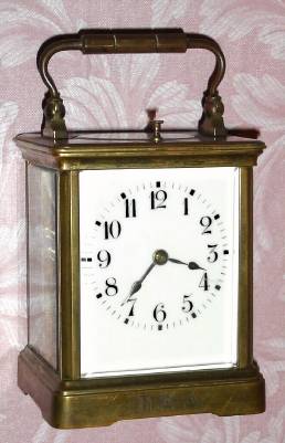 C.1905, French, Brass Cased Carriage Clock, Petite Sonnerie [strikes quarters], and gives full quarters and hours when the repeat button is pressed, presentation in a Corniche Carree case (extra wide). — Antique Clocks Price Guide