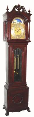 C.1915, Seth Thomas Clock Co, 8-day, 2-wt striking longcase clock with brass dial and rolling moon, mahogany case with chamfered corners, fancy side frets and removable hood. — Antique Clocks Price Guide