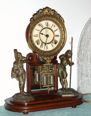 C.1878, Ansonia Clock Co., "Crystal Palace No. 1 Extra", 8-day time and bell strike, with walnut base, under a glass shade. — Antique Clocks Price Guide