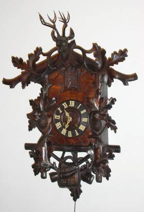 C.1900, German, 3-Note Trumpeter, carved wall clock, 2-dog motif, with spring powered movement [56 hour]. — Antique Clocks Price Guide