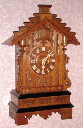 C.1890, German, Black Forest 1-day time and strike gothic style shelf cuckoo and quail clock (not quarter strike). The quail sounds his triple chirp before each cuckoo. — Antique Clocks Price Guide