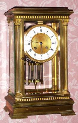C.1900, French, Japy Freres, 8-day time and strike crystal regulator mantel clock retailed by Black, Starr and Frost, New York, (on dial and movement) in a heavy cast brass case of Angle-riche style with full Corinthian columns at the corners and dentil trim. — Antique Clocks Price Guide
