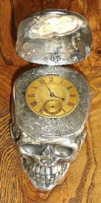 C.1910, an English "Skull Timepiece", silver and bone, the latch hallmarked, with a C.1840 English fusee, lever watch movement, key wound, with gilt dial. — Antique Clocks Price Guide