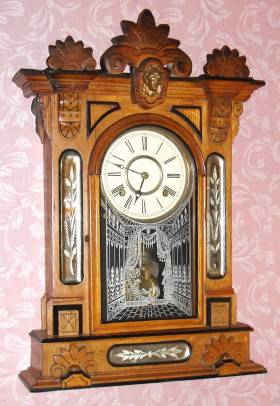 C.1885, William L. Gilbert Clock Co., "Amphion", 8-day time/strike oak and ebonized trim mantel clock, with restorations. — Antique Clocks Price Guide