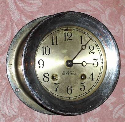 C.1940, Chelsea Clock Co., CHELSEA model, ship's bell, 8-day in a nickel plated case, serial 281942, 4.5" dial, screw bezel. — Antique Clocks Price Guide