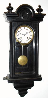 C.1850, Austrian, Small Wall  clock, 8-day time and strike, in an ebonized case. — Antique Clocks Price Guide