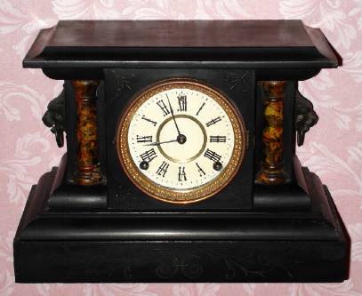 C.1900, E. N. Welch Mfg. Co., "Metropolis",  8-day time and strike wood black mantel clock. — Antique Clocks Price Guide