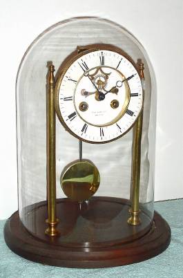 C.1960, Mixed Lot, consisting of a Marti and Cie French movement mounted to two brass supports under a dome, by Mr. Blackwell. — Antique Clocks Price Guide