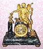 C.1890, French, Marble and Gilt bronze figural mantel clock, Victorious Archer,  that was retailed by A. Stowell and Co., Boston. 