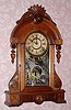 C.1878, F. Kroeber Clock Co., "Powhatan", 8-day time and strike walnut parlor clock. This model was also named the "Floretta" after 1880. 