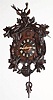 C.1900, German, Black Forest Cuckoo, Hunter Motif, with large and good carvings of a deer head, pheasant and rabbit, the substantial and robust movement of 8-day duration, uncommon spring driven (note winding arbors at 5+7). 
