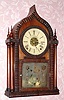 C.1848, Forestville Mfg, J. C. Brown, Rounded Gothic, or Onion top, in a rosewood, full ripple case, 8-day, T/S/Alarm. 