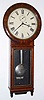 C.1886, Seth Thomas Clock Co., "Regulator No. 1", in walnut with burled walnut door and bezel, 8-day timepiece, with nickeled weight and damascene pendulum. 
