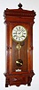 C.1893, Waterbury Clock Co., "Leeds", 8-day time and gong strike wall clock, in walnut. 