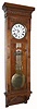 C.1885, Waterbury Clock Co., "Regulator No. 7", oak cased pinwheel jeweler's regulator, center sweep seconds, porcelain dial, lyre pend, and with original glass reading "Standard Time". 