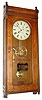 C.1888, E. Howard and Co., "Watch Clock for One Watchman", dial is 11", case is 4 feet six inches long and 19 inches wide, of solid oak, with 31" pendulum. 
