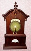 C.1864, L. E. Whiting, Saratoga Springs, NY, "Timby Solar Time-Piece, No. 288, mahogany case with double 12 hour dial, 6" terrestrial globe, and minute dial below. The patent for this hard to find clock was held by Theodore R. Timby, who designed the clock and developed the movement. 