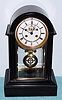C.1890, French, Sam'l Marti, Mantel regulator, black slate with large movement, open escapement dial, and Ellicott style pendulum. 