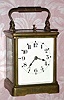 C.1905, French, Brass Cased Carriage Clock, Petite Sonnerie [strikes quarters], and gives full quarters and hours when the repeat button is pressed, presentation in a Corniche Carree case (extra wide). 