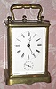C.1870, Swiss, Brass Cased Carriage Clock, time, strike, repeat and alarm, in a Corniche style case, the strike-work all on the rear plate. 