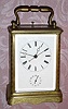 C.1870, Swiss, Brass Cased Carriage Clock, time, strike, repeat and alarm in a finely engraved case [scroll pattern], and with center seconds hand. 