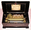 C.1870, Swiss, 8-tune Music Box with snare drum and bells with dove strikers, and original tune sheet. 