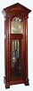 C.1905, English, J. J. Elliott, 121 Rosebery, London, 9-Tube, Quarter Chime, Rolling Moon, Hall clock, 2-tune, Westminster or Whittington, in a mahogany case with full round columns and an architectural top. 
