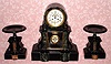 C.1890, French, Unsigned, Black marble and onyx 3-piece mantel clock set, with open escapement and Ellicott pendulum. 