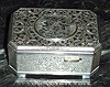 Late 20th Century, German, Singing Bird Box, silver plated over fancy embossed design that has the appearance of engraving. 