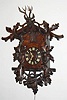 C.1900, German, 3-Note Trumpeter, carved wall clock, 2-dog motif, with spring powered movement [56 hour]. 