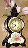 C.1895, Ansonia Clock Co., Royal Bonn "La Capelle", 8-day time/strike porcelain mantel clock, in cobalt blue with gold highlights. 
