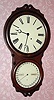 C.1865, Seth Thomas Clock Co., "Office Calendar No. 4", double dial perpetual calendar, wall timepiece, 8-day, in rosewood. An 1863 catalog litho of this model shows it with plain dials and the earlier moon hands as found on this example. 