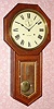 C.1909 Seth Thomas Clock Co., "World", 15-day wall timepiece, long door model.