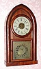 C.1910, Jerome and Co. (New Haven Clock Co.), 8-day Turner's Patent alarm beehive timepiece (for those who need a loud alarm). You usually find this alarm movement in steeple cases, so this is a bit uncommon; note alarm train takes the place of the strike train.