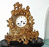 C.1870, French, P. Lesperut, Paris, 8-day time and strike cast white metal figural mantel clock, silk thread, under a dome. 