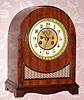 C.1900, Mixed lot consisting of a French movement with exposed escapement now fitted to a German mahogany veneered case.