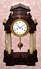 C.1830, Austrian, Walnut veneer over pine, 1-day time and strike mantel clock in classic portico style with alabaster columns. 