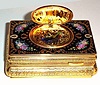 Late 20th Century, Singing Bird Box, the dore case decorated with cobalt blue enamel with pink floral accents in the corners, 