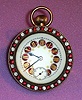 C.1900, Swiss, Glass Ball Paperweight clock, with a bezel of ruby and clear rhinestones, stem wind, pin set. 
