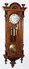 C.1875, Austrian, 3-Wt Grand Sonnerie wall clock in a walnut veneer case with carved Corinthian side columns, as-found. 
