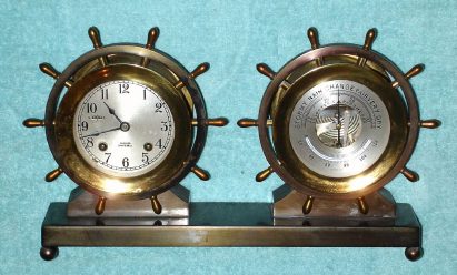 C.1962 Chelsea Clock Co., Claremont model, tu-tone polished brass and bronze case, Ship's Bell clock and barometer desk set with 3.75" dials, 8-day, and with mercury-tube thermometer. — Antique Clocks Price Guide
