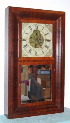 C.1840, Silas B. Terry, Terryville, Conn., Mahogany over-sized, double door OG shelf clock with large 8-day time and strike movement, with lyre front plate and solid rear plate. — Antique Clocks Price Guide