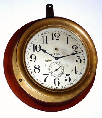 C.1920, Seth Thomas for US Navy, 8.5" diameter dial (7.5" chapter), 8-day time only 7 jeweled movement, in a turned brass case 10.5" diameter, sold as "Ship's lever No. 8" — Antique Clocks Price Guide