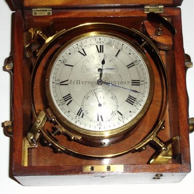 C.1810, James Hatton, London, 8-Day Marine Chronometer, serial No. 444, double frame movement with reverse fusee, Harrison's ratchet and Earnshaw type spring detent escapement, a large seconds dial with Arabic 10 second figures, and with up-down indication to 7+ days. — Antique Clocks Price Guide