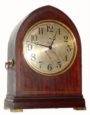 C.1916, Chelsea Clock Co., GOTHIC, 10" dial, eight-day time and house strike on gong, in a mahogany case with inlay. — Antique Clocks Price Guide