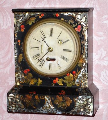C.1852, S. B. Terry, 30-hour Torsion timepiece, in a mini iron case with MOP inlays and painted flowers. — Antique Clocks Price Guide