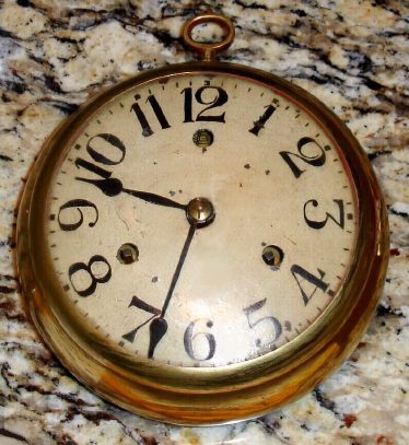 C.1835, Richard Ward, Salem Bridge, Conn, Rare Chronometer Clock, 30-hour time and strike, in a large brass, "watch shaped" case, cylinder escapement. This clock is described in both Blackwell's article in the Nawcc Bulletin of April 1976, and in the supplement by Bailey dated June 1980. — Antique Clocks Price Guide