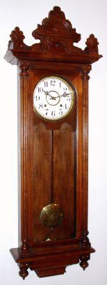 C.1915, Waterbury Clock Co., DRESDEN,  30-day wall clock in walnut, with large Waterbury double spring movement. — Antique Clocks Price Guide