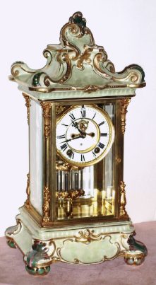 C.1914, Ansonia Clock Co., Porcelain Regulator No. 5, 8-day time and gong strike mantel clock, a crystal regulator with porcelain top and bottom, this one in iridescent light green with very dark green accents and gold highlights. — Antique Clocks Price Guide